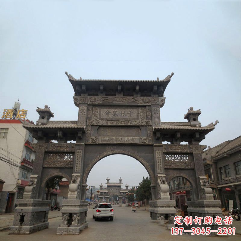 安徽城市街道仿古三门石雕牌楼
