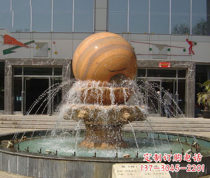 安徽石来运转球晚霞红风水球石雕